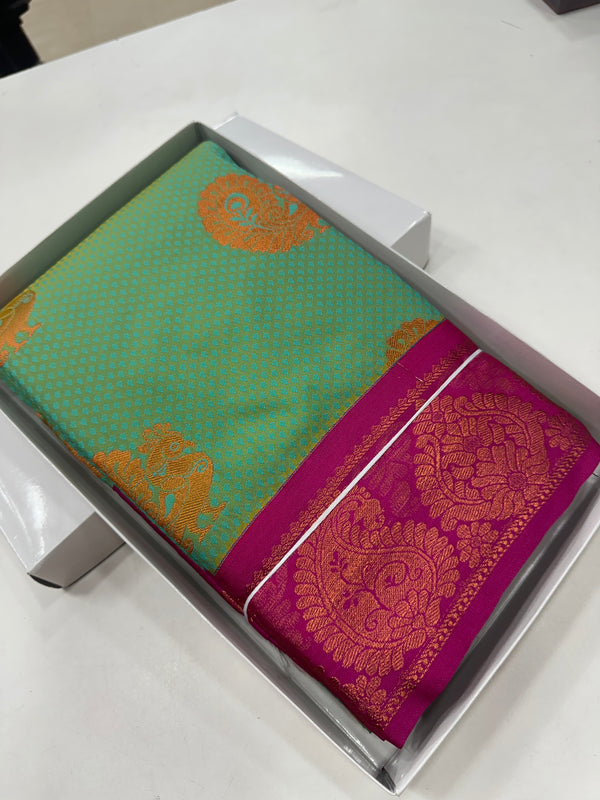 Kanchi Self Embossed Silk Saree